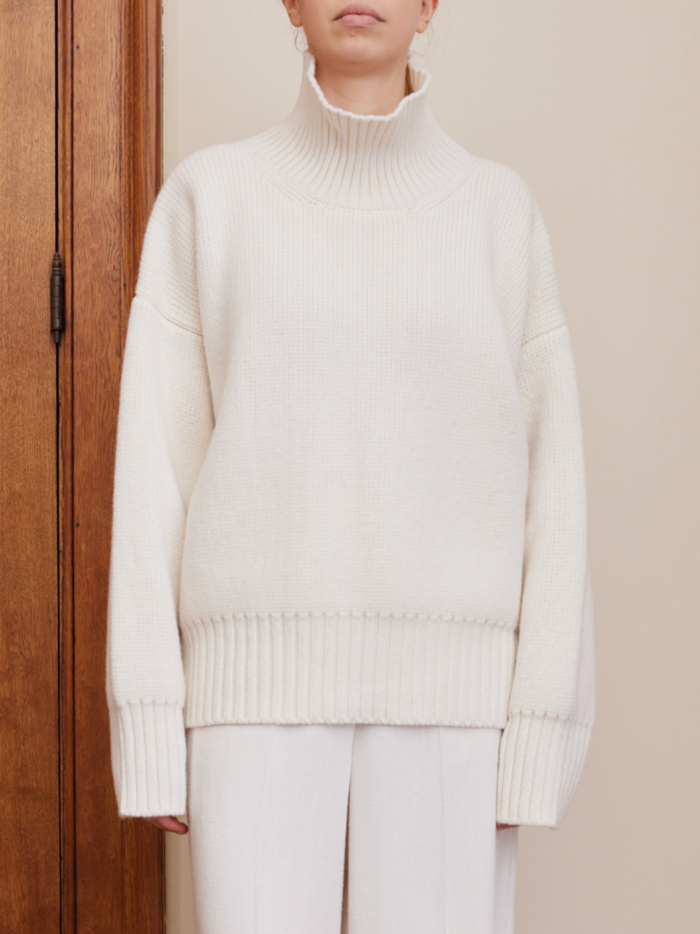 Compact Knitted High Neck Jumper in White